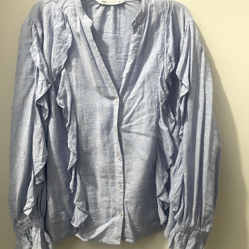 Oxford blue v neck linen blouse w ruffles on front and on sleeves